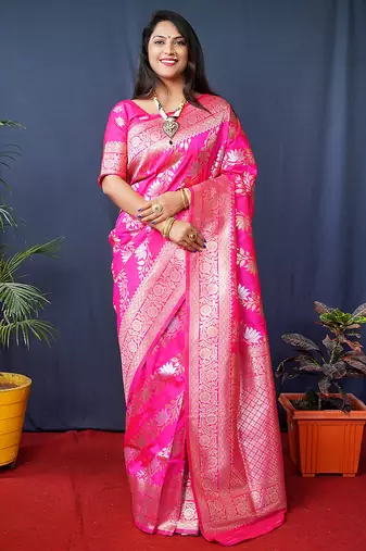 Rani pink woven banarasi silk blend saree with blouse
