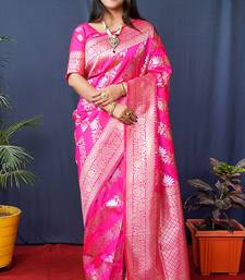 Rani pink woven banarasi silk blend saree with blouse