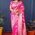 Rani pink woven banarasi silk blend saree with blouse