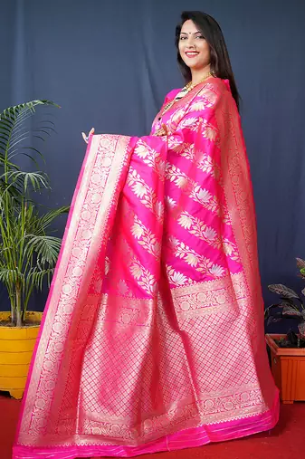 Rani pink woven banarasi silk blend saree with blouse
