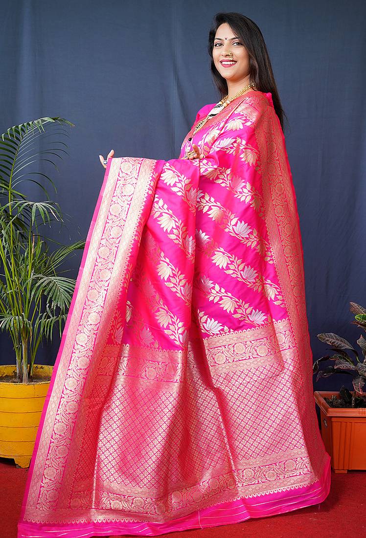 Rani pink woven banarasi silk blend saree with blouse