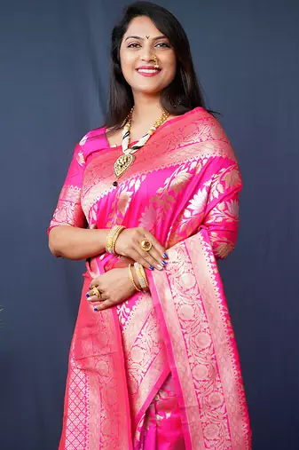 Rani pink woven banarasi silk blend saree with blouse