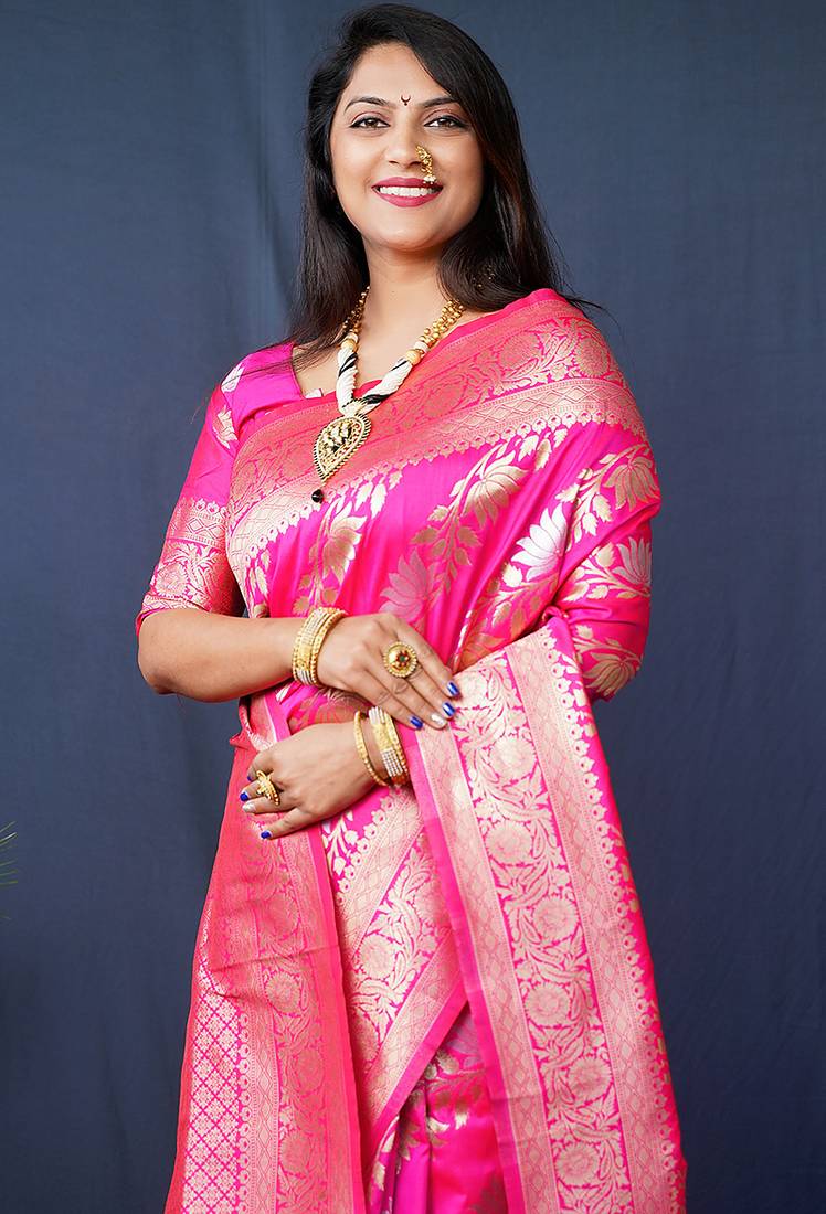 Rani pink woven banarasi silk blend saree with blouse
