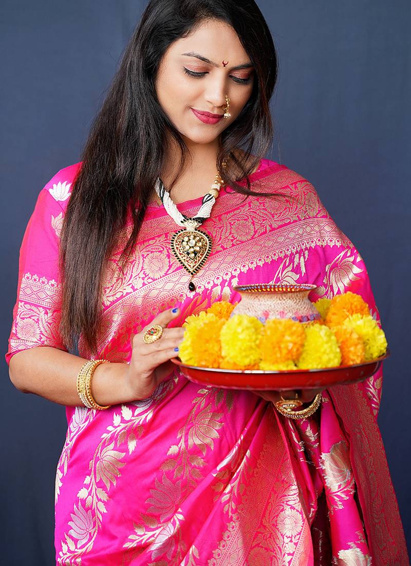Rani pink woven banarasi silk blend saree with blouse