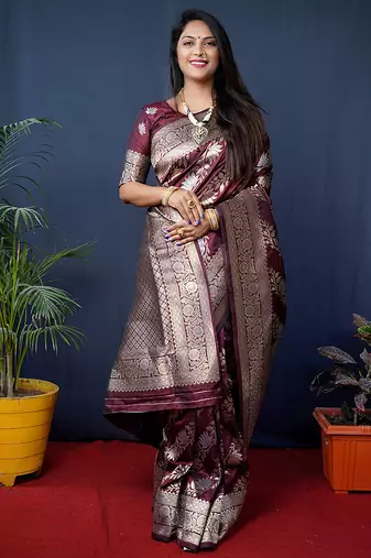 Maroon woven banarasi silk blend saree with blouse