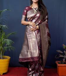 Maroon woven banarasi silk blend saree with blouse