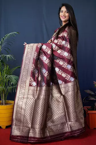 Maroon woven banarasi silk blend saree with blouse