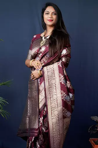 Maroon woven banarasi silk blend saree with blouse