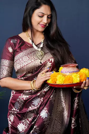 Maroon woven banarasi silk blend saree with blouse