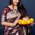 Maroon woven banarasi silk blend saree with blouse