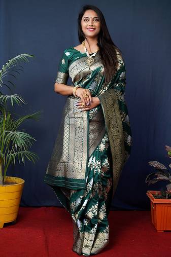 Dark green woven banarasi silk blend saree with blouse