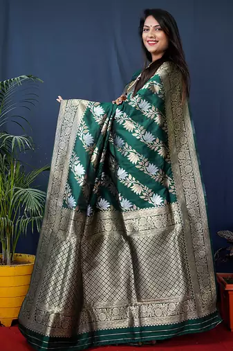 Dark green woven banarasi silk blend saree with blouse