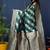 Dark green woven banarasi silk blend saree with blouse