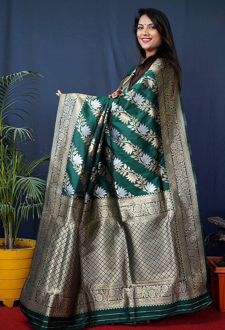 Dark green woven banarasi silk blend saree with blouse