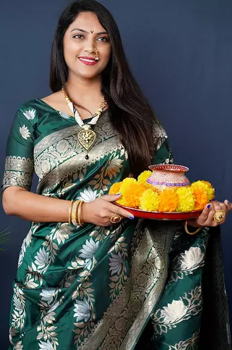 Dark green woven banarasi silk blend saree with blouse