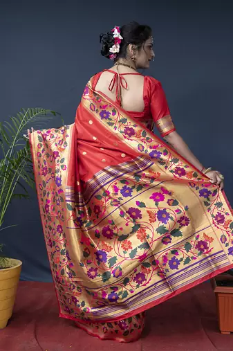 Red zari woven paithani silk blend saree with blouse