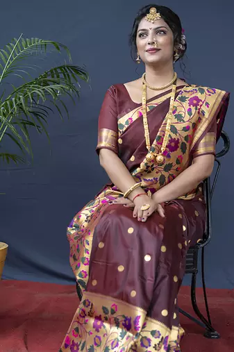 Maroon zari woven paithani silk blend saree with blouse