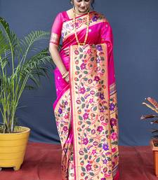 Rani pink zari woven paithani silk blend saree with blouse