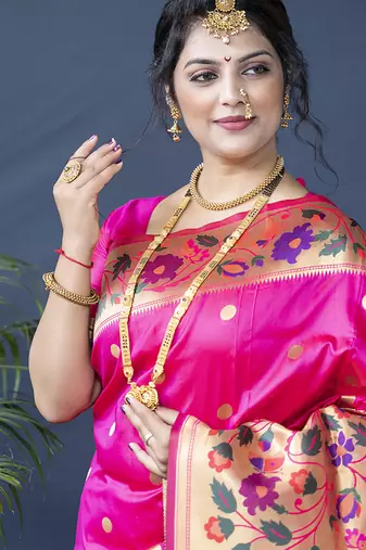 Rani pink zari woven paithani silk blend saree with blouse