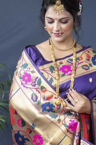 Violet zari woven paithani silk blend saree with blouse