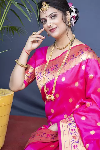 Rani pink zari woven paithani silk blend saree with blouse
