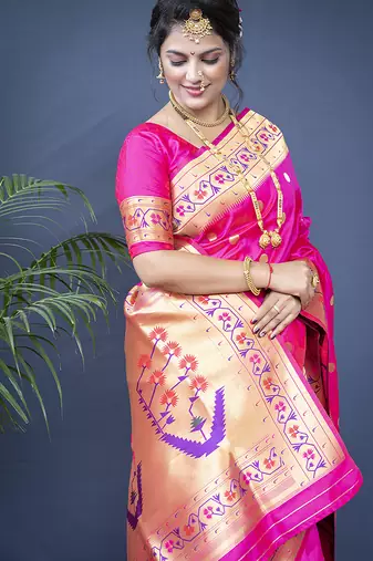 Rani pink zari woven paithani silk blend saree with blouse