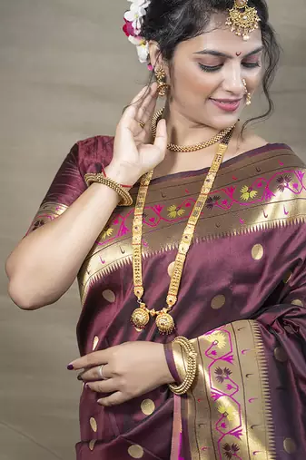 Maroon zari woven paithani silk blend saree with blouse