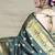 Deep teal green banarasi silk blend saree with golden zari work