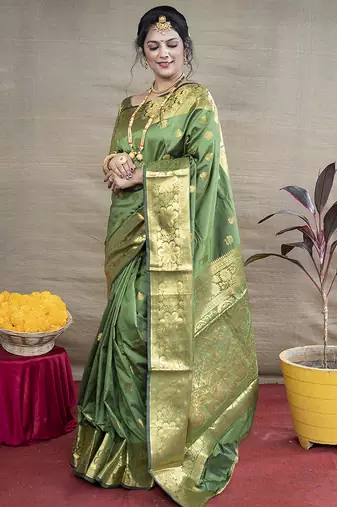 Green banarasi silk blend saree with golden zari work