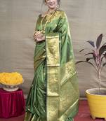 Green banarasi silk blend saree with golden zari work