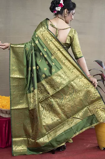 Green banarasi silk blend saree with golden zari work