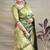 Green banarasi silk blend saree with golden zari work