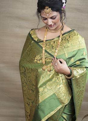 Green banarasi silk blend saree with golden zari work 4