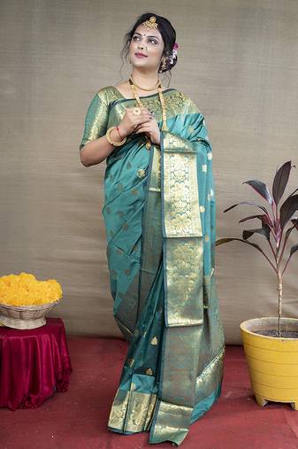 Turquoise banarasi silk blend saree with golden zari work