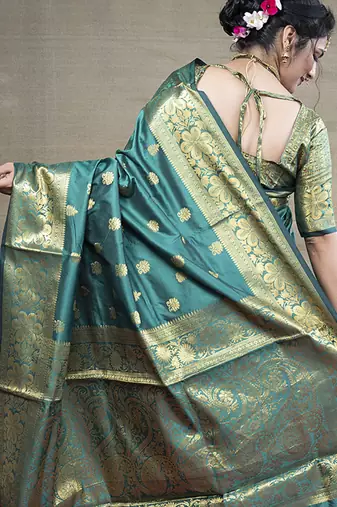 Turquoise banarasi silk blend saree with golden zari work