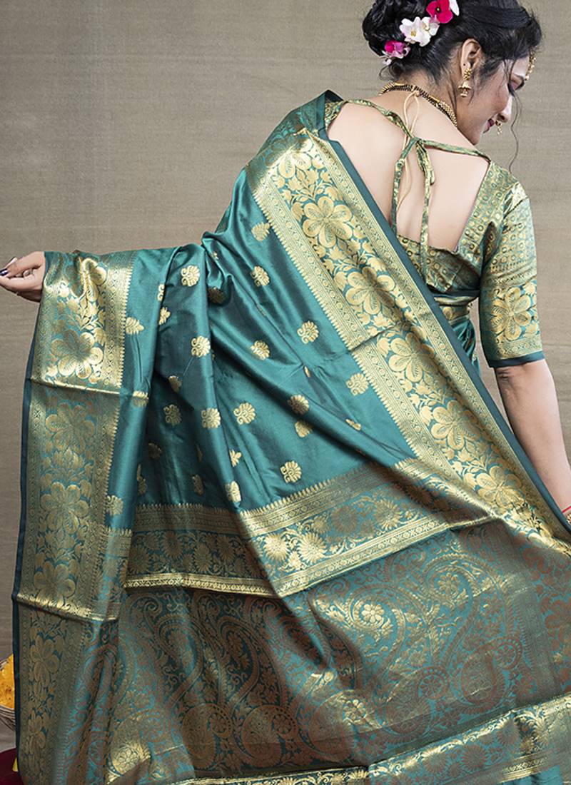Turquoise banarasi silk blend saree with golden zari work