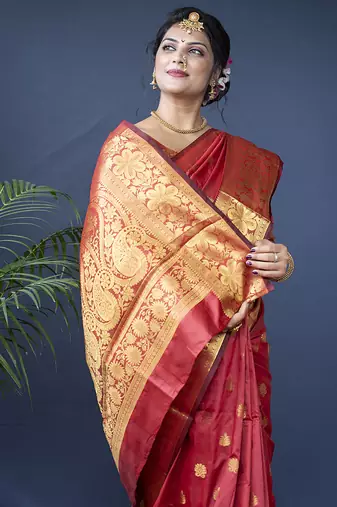 Red banarasi silk blend saree with golden zari work