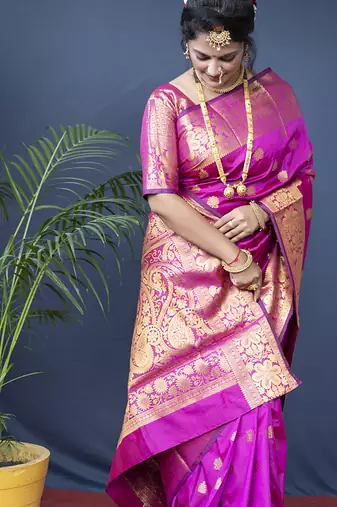 Rani pink banarasi silk blend saree with golden zari work