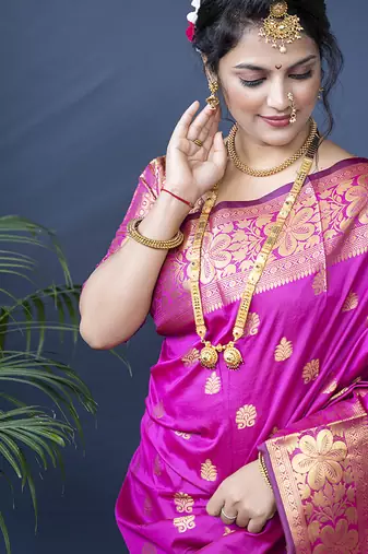 Rani pink banarasi silk blend saree with golden zari work
