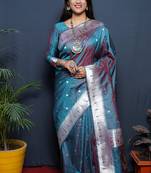 Teal blue paithani silk blend saree with silver zari border