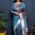 Teal blue paithani silk blend saree with silver zari border