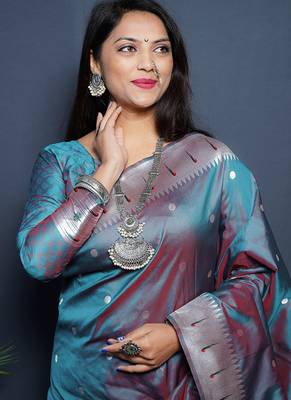 Teal blue paithani silk blend saree with silver zari border 4