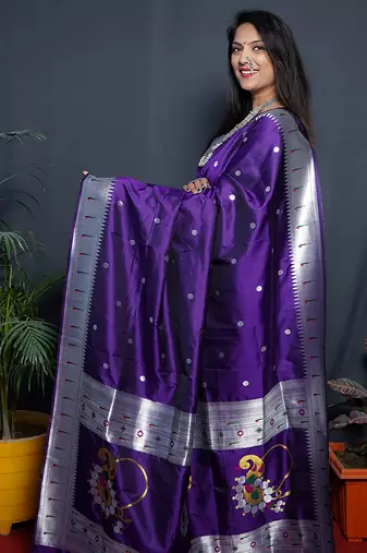 Purple paithani silk blend saree with silver zari border
