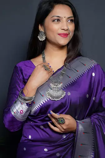 Purple paithani silk blend saree with silver zari border