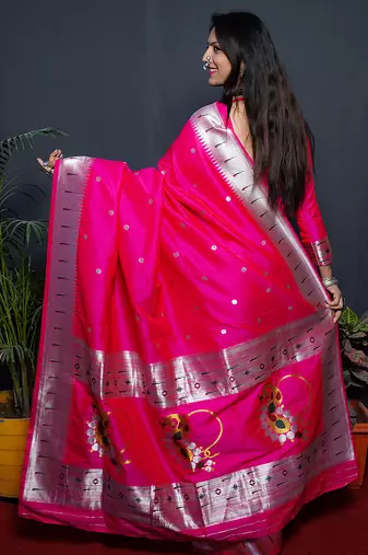 Rani pink paithani silk blend saree with silver zari border