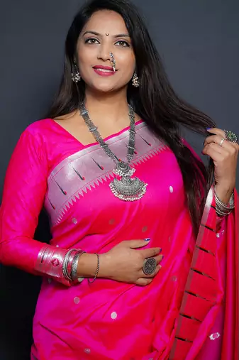 Rani pink paithani silk blend saree with silver zari border