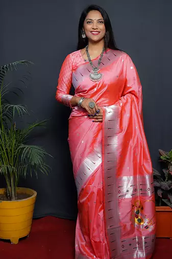 Peach paithani silk blend saree with silver zari border