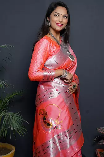 Peach paithani silk blend saree with silver zari border