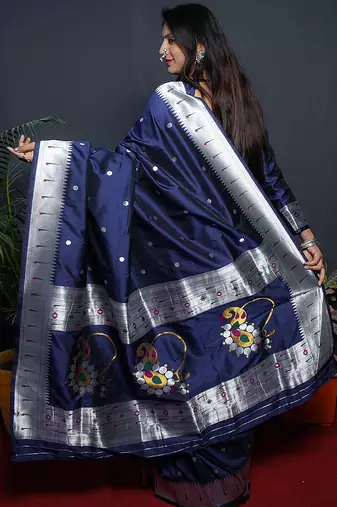 Navy blue paithani silk blend saree with silver zari border