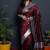 Maroon paithani silk blend saree with silver zari border